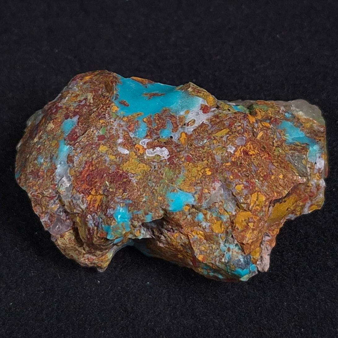 Chrysocolla with Cuprite and Quartz Rough from Mt. Isa ZRC005