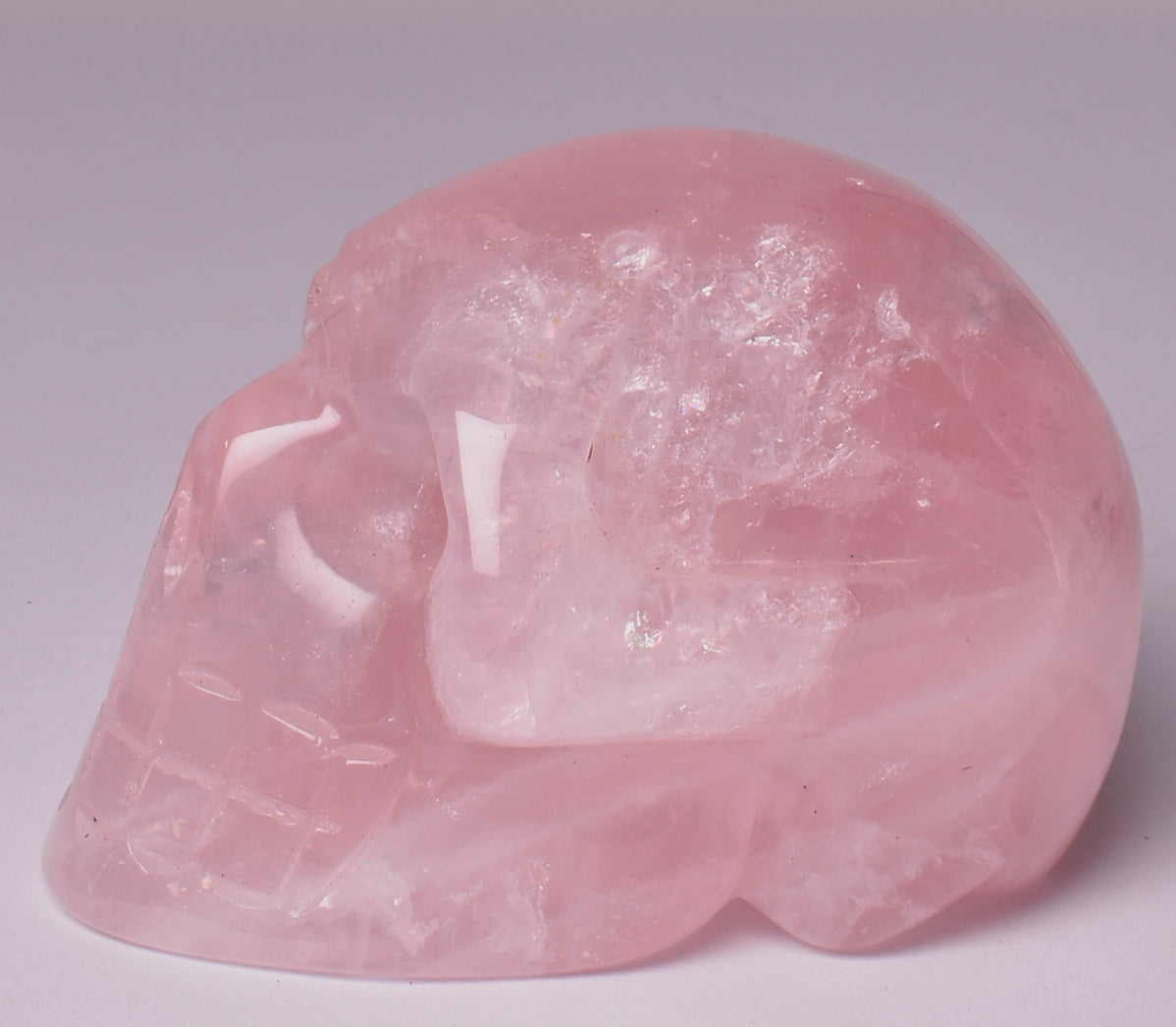 ROSE QUARTZ CRYSTAL CARVED SKULL P103