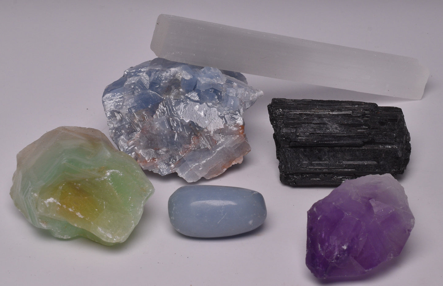 BLUE CALCITE, GREEN CALCITE, SELENITE ROD, TOURMALINE, AMETHEYST POINT AND ANGELITE P803