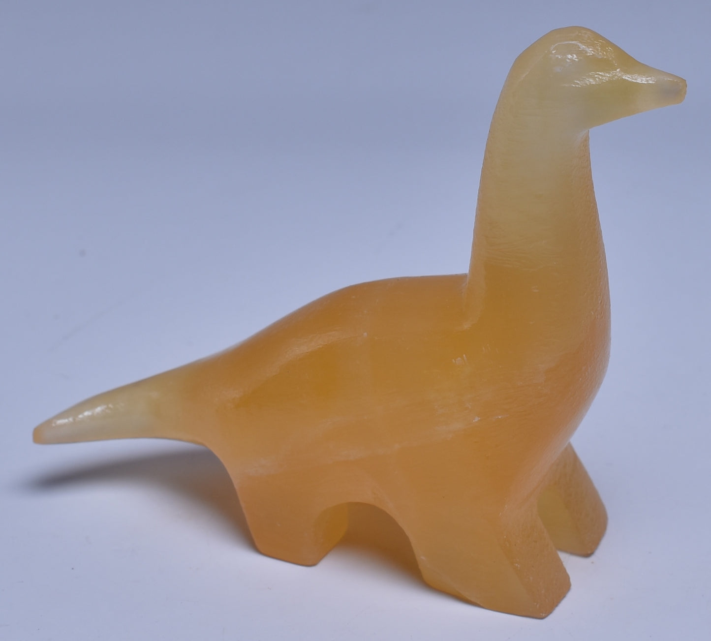 ORANGE CALCITE CRYSTAL DINOSAUR CARVING P512